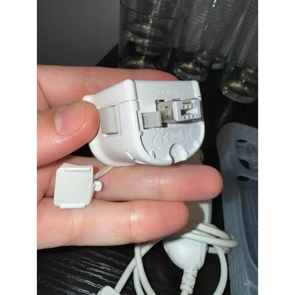 Nintendo Wii Remote with Nunchuk and Wii MotionPlus Adapter